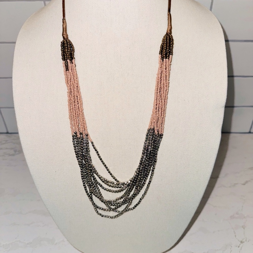 LOFT pink, gold & bronze beaded necklace with wrapped leather